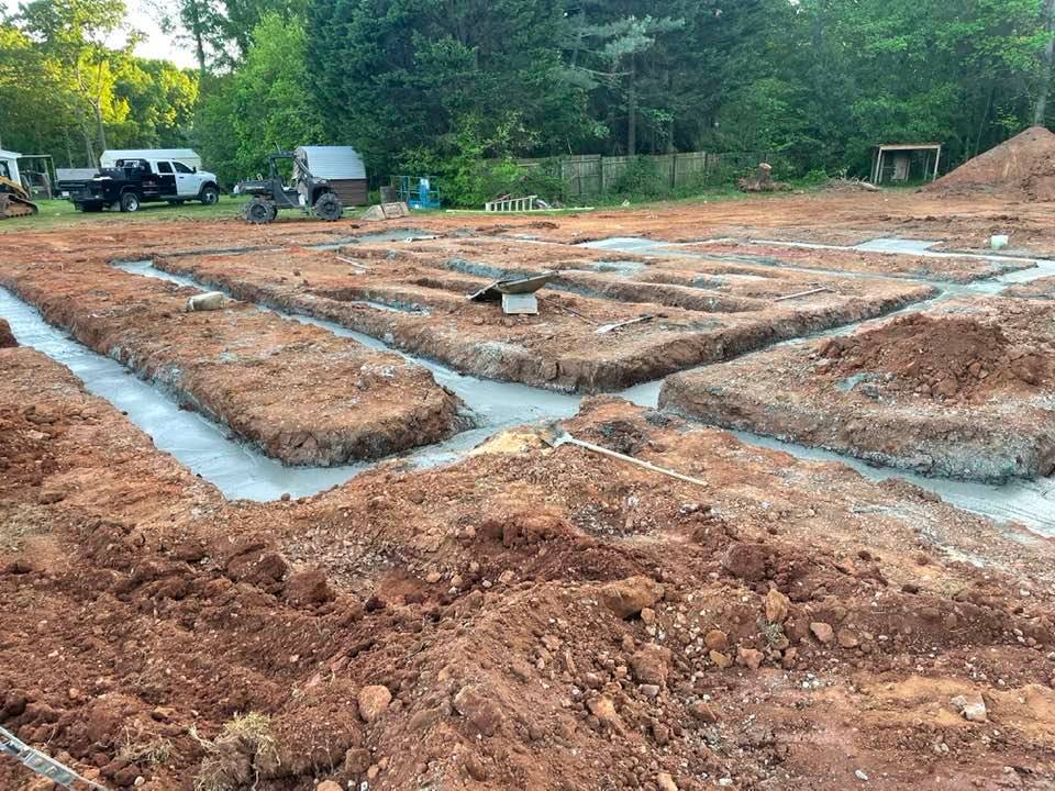 Foundation footings in red clay, graded site